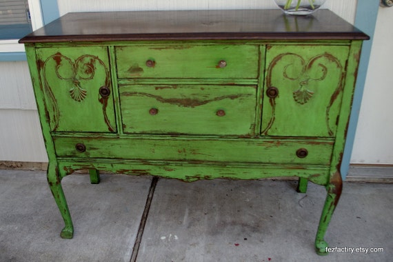 Curvy green distresed antique sideboard