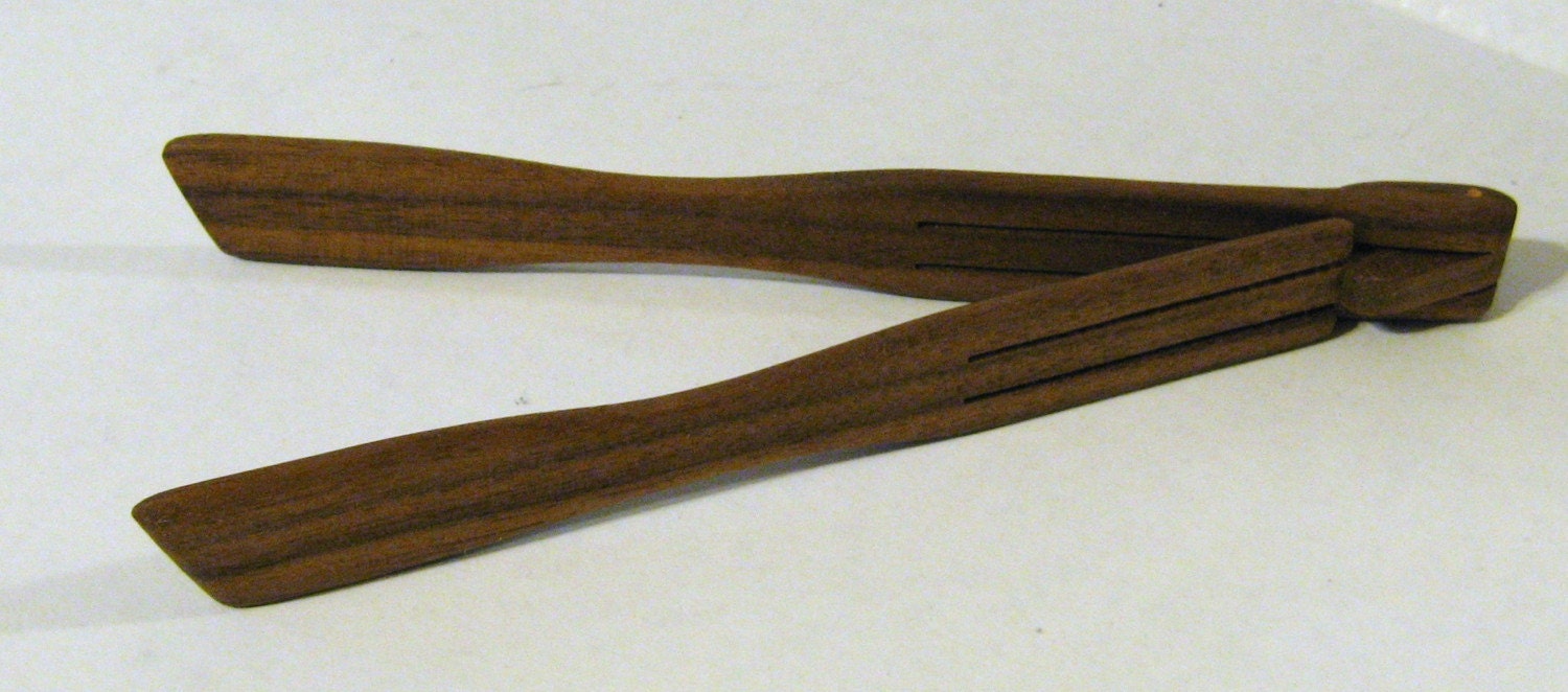 Small Spring Tongs Made Of Walnut Wood
