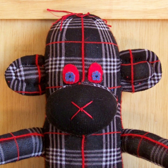 red and white striped sock monkey