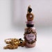 Alice in Wonderland Copper Pink and Black 'Drink Me' Bottle Pendant