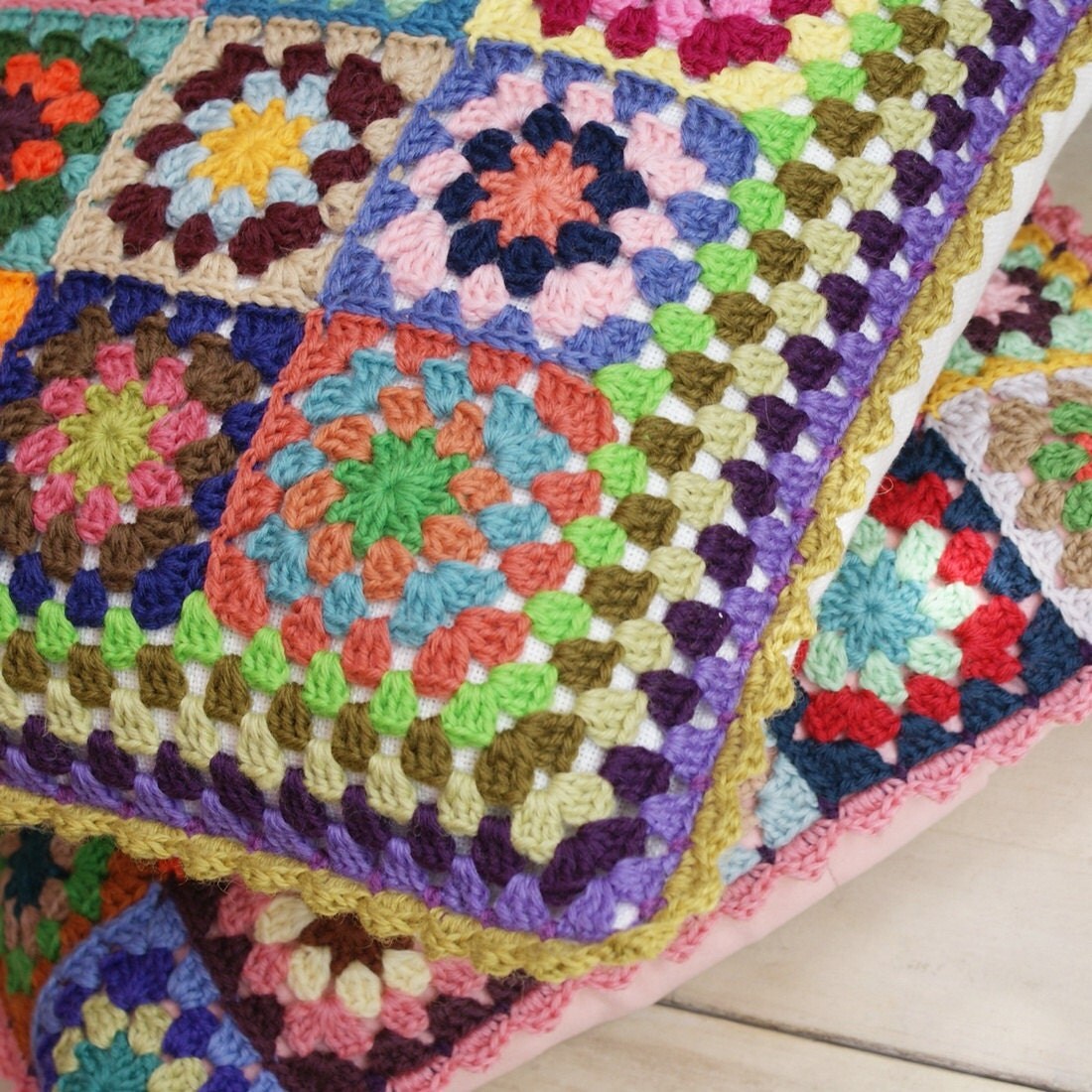 crochet 'granny square' cushion cover