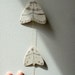 moths - paper and wax string mobile