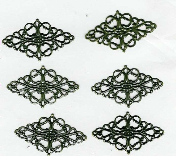 6 diamond flower METAL embellishments vintage lot