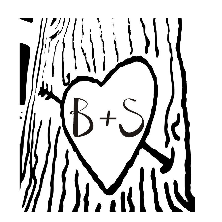 heart carved on a tree with initials carved in by stampoutonline