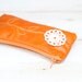 Recycled Tangerine Orange Leather Pouch with Doily Flower