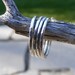 Four Sterling Silver Hand Forged Stacking Rings -