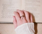 Adjustable vintage brass ring with embossed floral design and tiny skeleton key - The secret