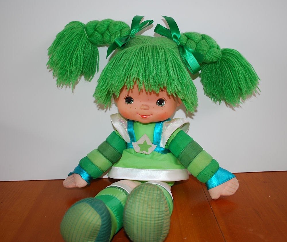 green doll cartoon