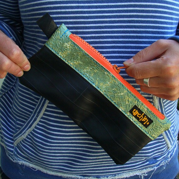 Recycled bicycle inner tube and repurposed vinyl