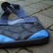 Purse bag iPad case made from reclaimed materials bike inner tube, seat belt and recycled vinyl