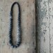 Manifesto Carved Bead Necklace