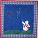 Quilted wall hanging American snowman with sparkler