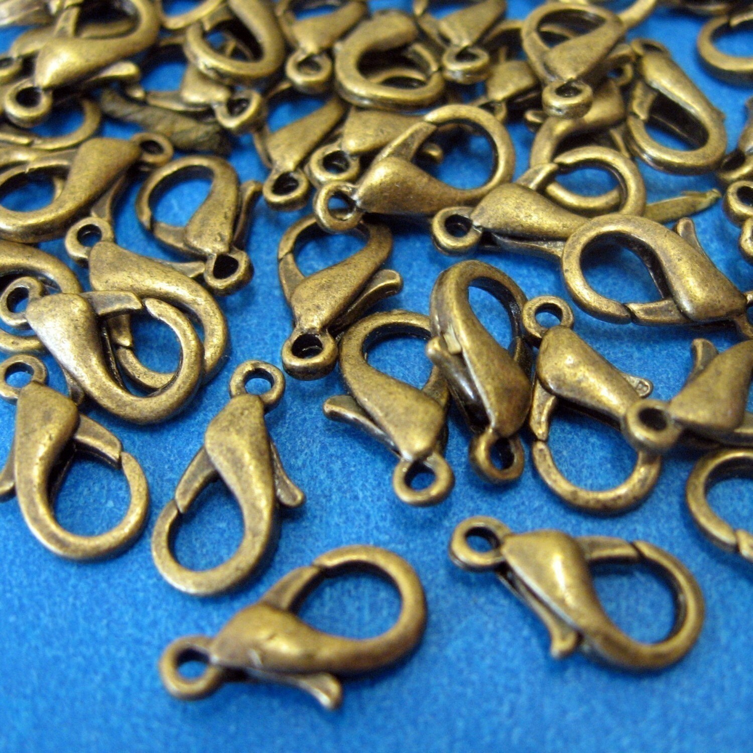 Antique Brass Lobster Clasps....24 12mm