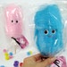 Two little cotton candies...one pink and one blue