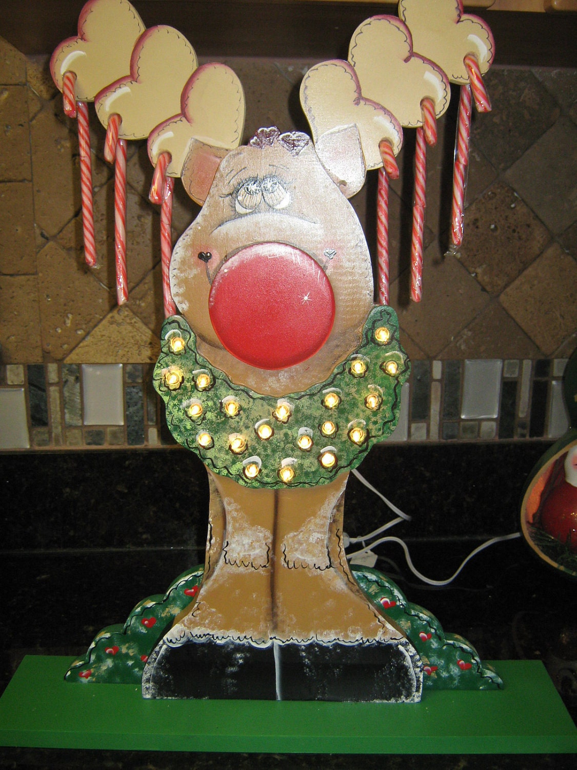 Reindeer Centerpiece Lighted with wreath and candy canes