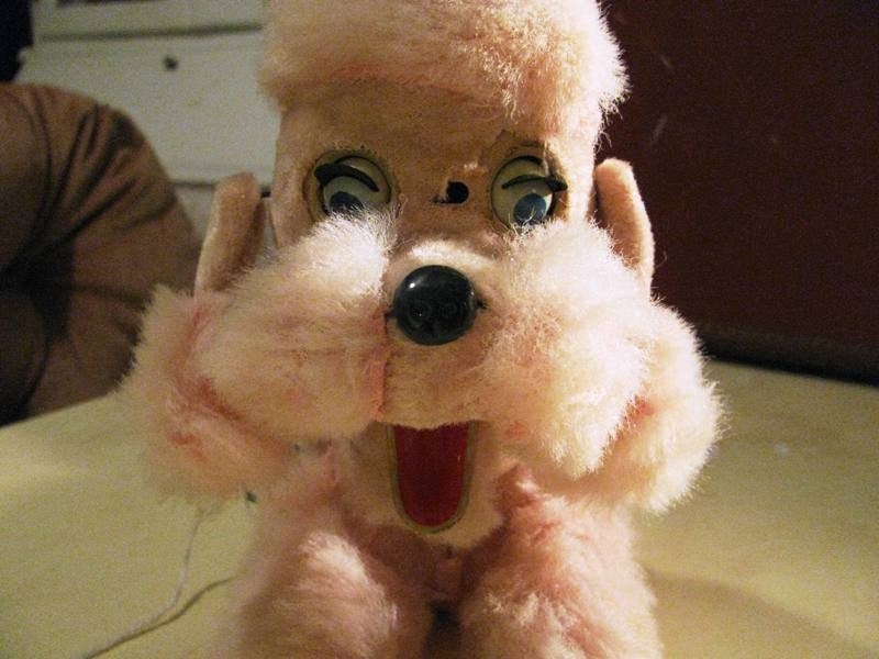 realistic stuffed poodle