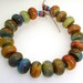 Handmade Lampwork Bead Set Caramel Slate Blue Iris Orange Rust Olive Green Khaki Aqua Teal Raku -- King of Night Vision