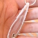 Detalles- Agate slice, sterling silver and tiny cubic zircon pendant.