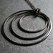 Geometric Circles Necklace in gunmetal