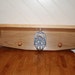 Wall shelf with shaker pegs and unique Metal bears hook.