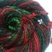 Glittering Art Yarn - MERRY CHRISTMAS - Festive Handspun. Red, Green. Holly Charms, Pearls and Silk Ribbons. 89 yards, 3.56 oz