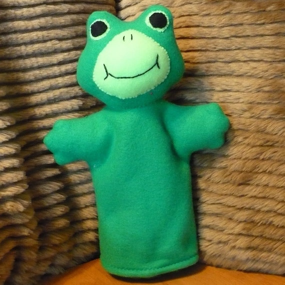 green frog cartoon puppet