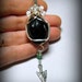 Apache's Tear: Authentic Apache's Tear with Turquoise and a pewter arrow head, pendant