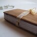 Small journal with wooden covers and organza ribbon
