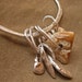 Fossil Ivory and Fine Silver Nugget Charm Bangle Bracelet