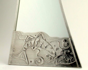 Bathroom mirror.Pewter. Big fish little fish.