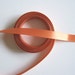 Double-sided burnt orange satin ribbon 5/8 inch wide x 5 yards