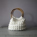 vintage. white. knit. sweater. bag. purse. wooden bamboo handles.