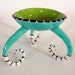 colorful ceramic dish :) with long striped legs