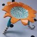whimsical bright ceramic dish with legs