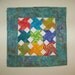 Contemporary Windmill - Batik Quilted Table Topper