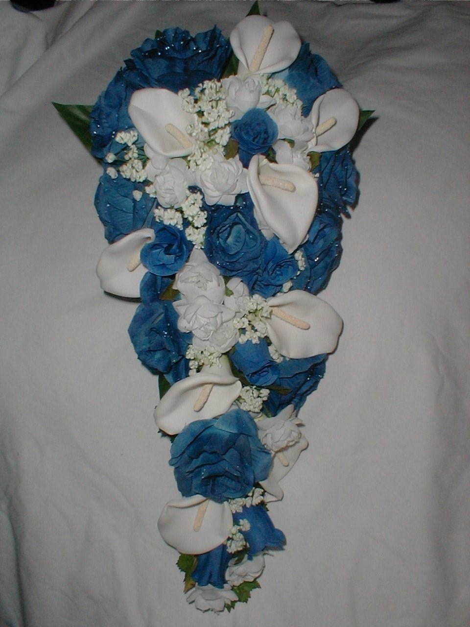 WHITE CALLA LILY ROYAL BLUE ROSES CASCADE BOUQUET