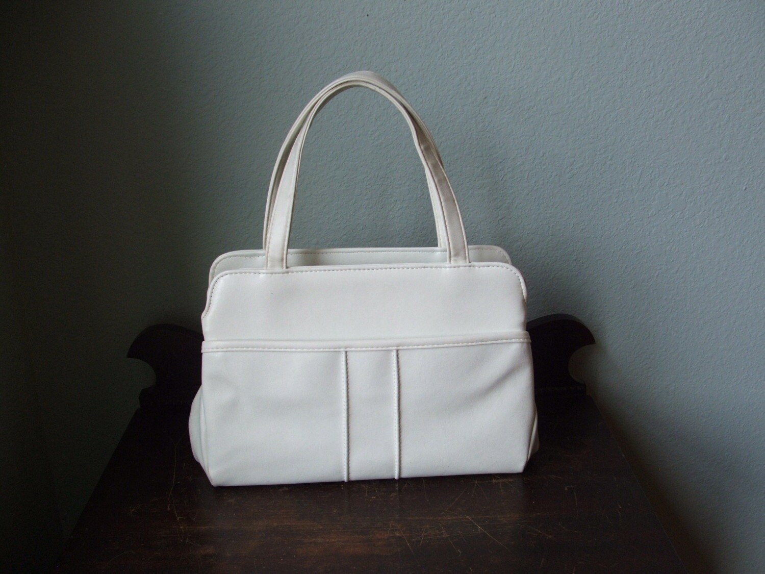 white faux leather bag