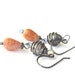 orange dangle earrings with fire agate drops and sterling silver