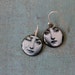 Wink - two funny faces hanging on sterling silver hooks