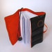 Recycled journal, bike inner tube, blank pages, orange linen and elastic, small.