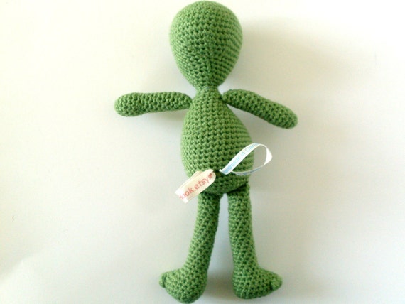 green alien plush toy