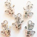 10 Crafter Cup Charms (3D) 19x13mm ITEM:X18