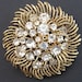 Vintage LISNER Signed Rhinestone and Gold Tone Brooch
