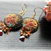 Golden Freshwater Pearls,Magma colored CZ briolette, clay details in black red and Gold - la belle ferroniere