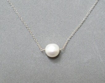 white freshwater pearl silver necklace by rockedjewelry