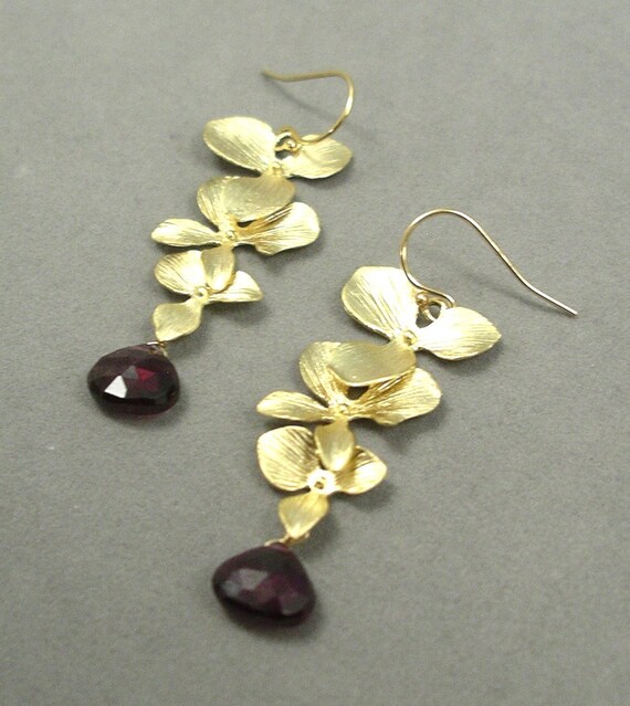 Items similar to orchid earrings in gold with pink rhodolite on Etsy