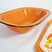 vintage orange enamel metal serving bowl