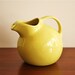 Vintage yellow Hall's pitcher, ball jug