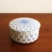 Navy blue and white round porcelain box with lid