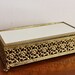 Vintage brass filigree jewelry box with lid